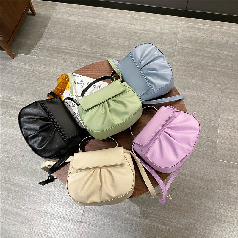 Pleated portable one shoulder cross saddle bag