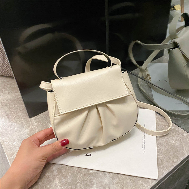 Pleated portable one shoulder cross saddle bag