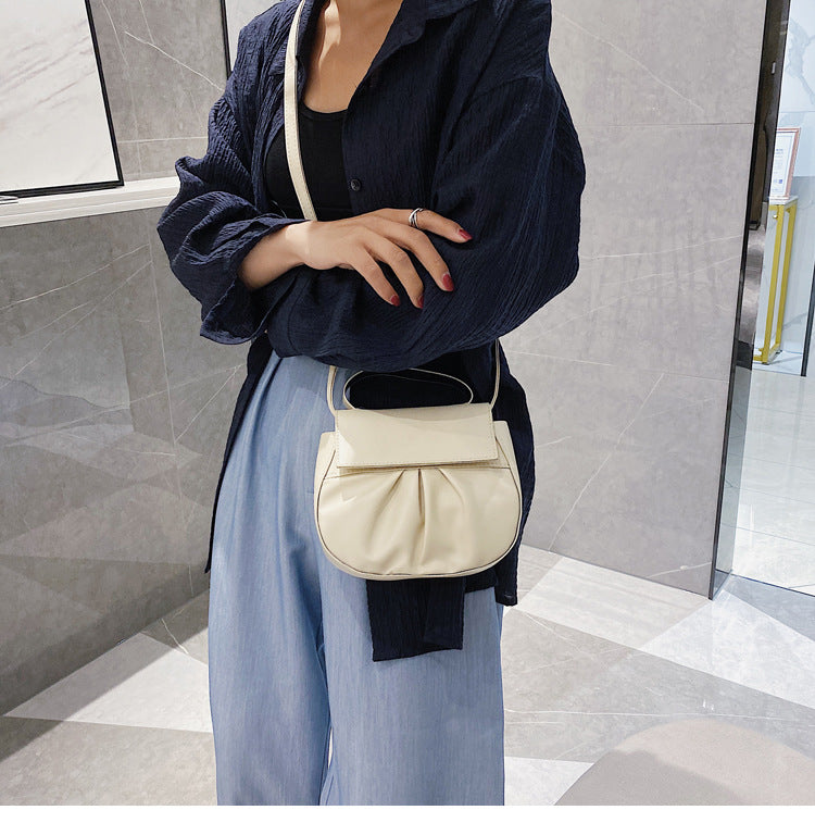 Pleated portable one shoulder cross saddle bag