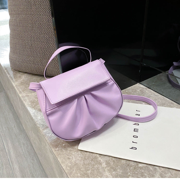 Pleated portable one shoulder cross saddle bag