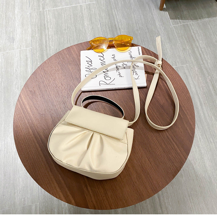 Pleated portable one shoulder cross saddle bag