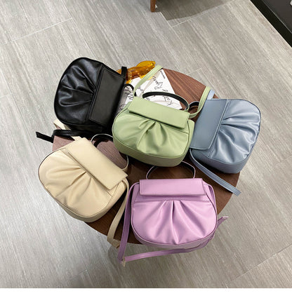 Pleated portable one shoulder cross saddle bag