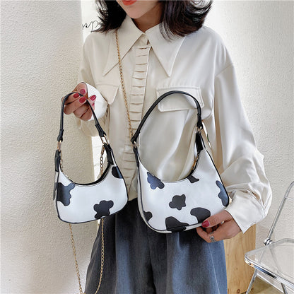 Cow pattern portable messenger bag