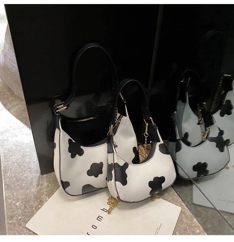 Cow pattern portable messenger bag