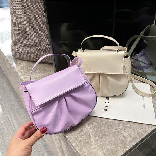 Pleated portable one shoulder cross saddle bag