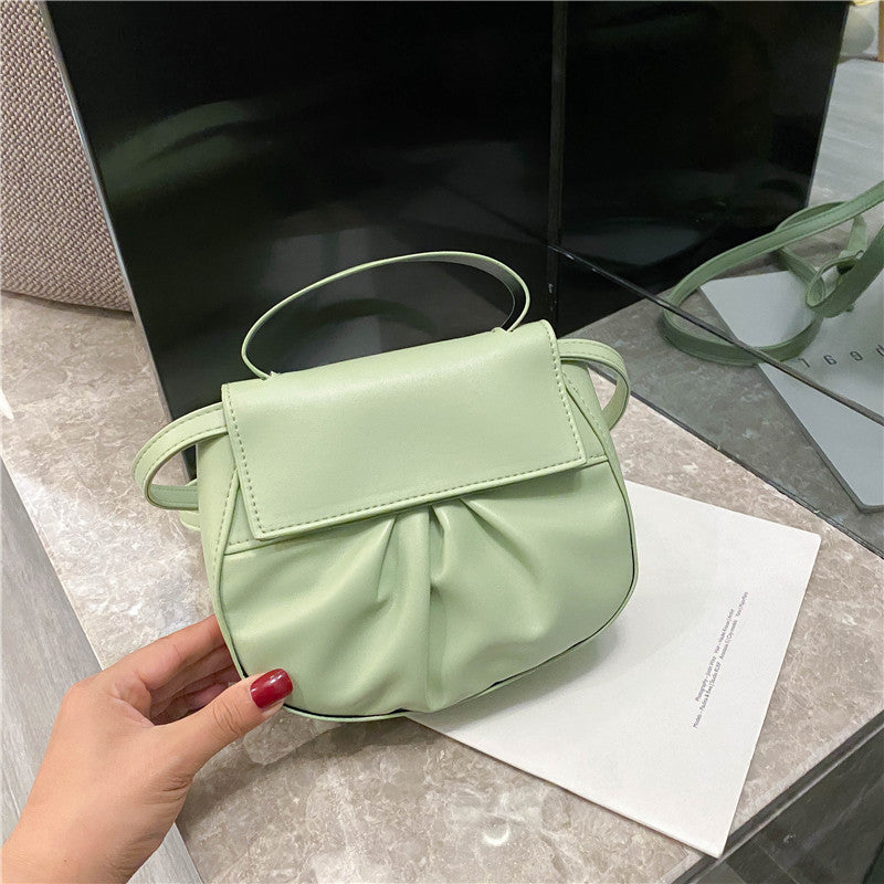 Pleated portable one shoulder cross saddle bag