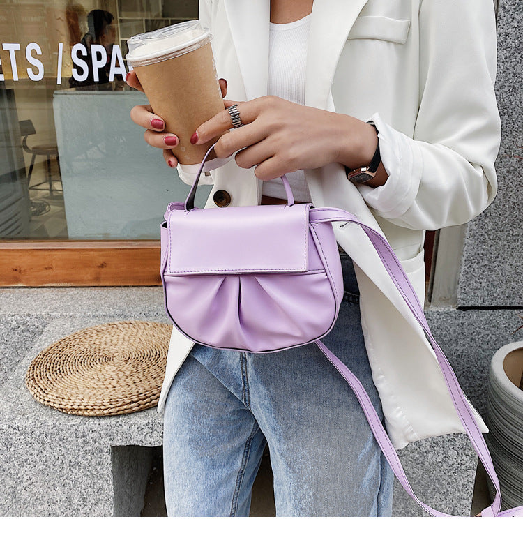 Pleated portable one shoulder cross saddle bag