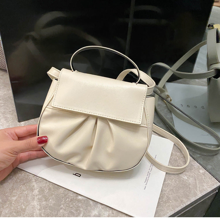 Pleated portable one shoulder cross saddle bag