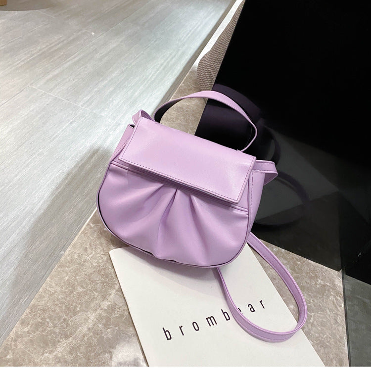 Pleated portable one shoulder cross saddle bag
