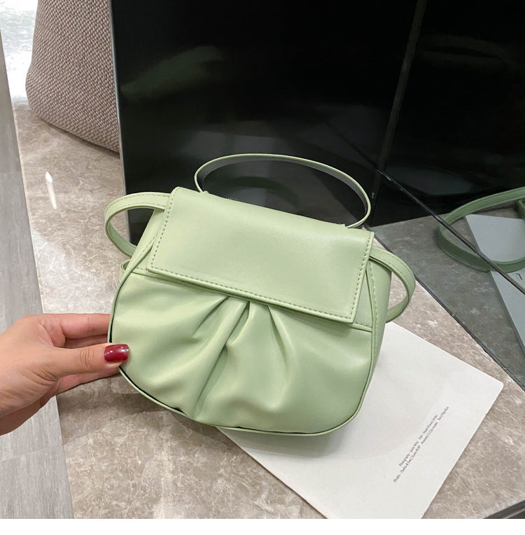 Pleated portable one shoulder cross saddle bag
