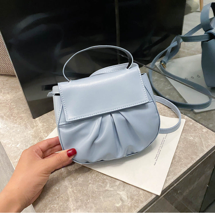 Pleated portable one shoulder cross saddle bag