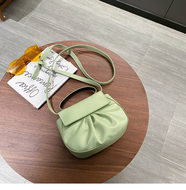 Pleated portable one shoulder cross saddle bag