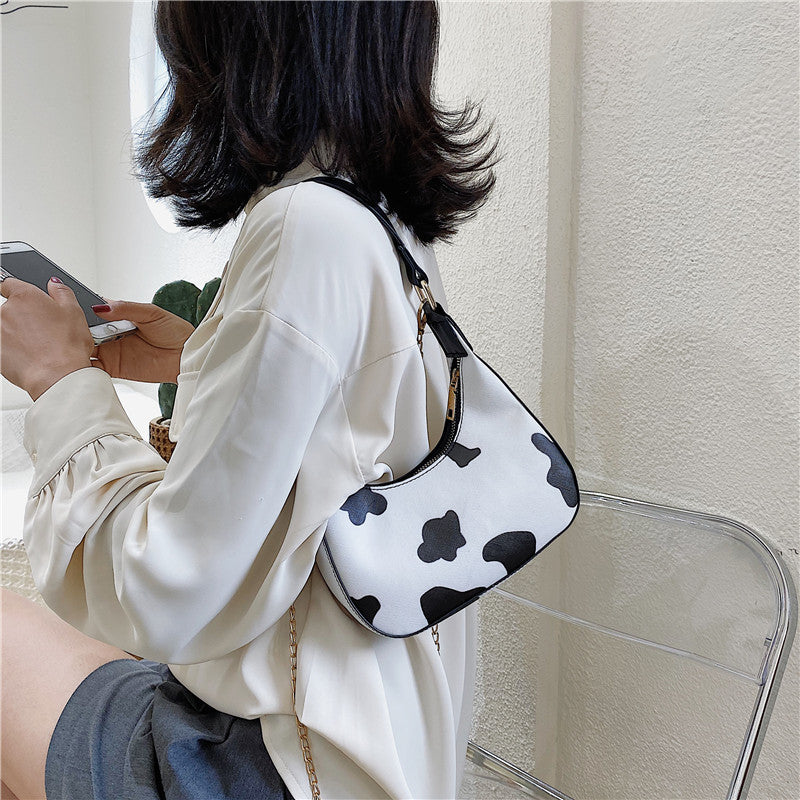 Cow pattern portable messenger bag