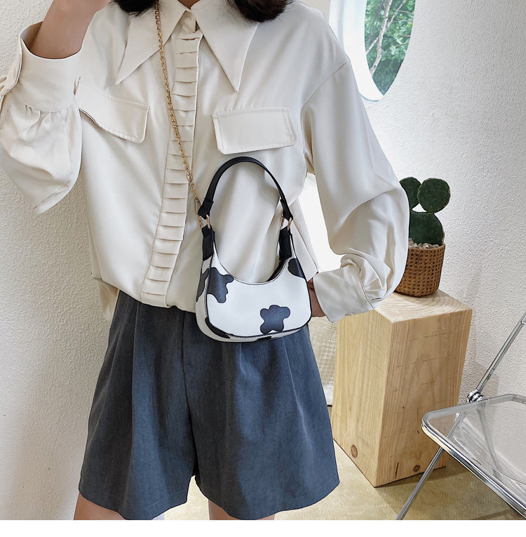 Cow pattern portable messenger bag