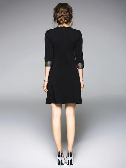 Elegant Bird Embroidered Mini Dress