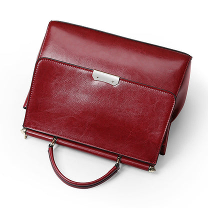 genuine leather-in-water wax cowhide handbag