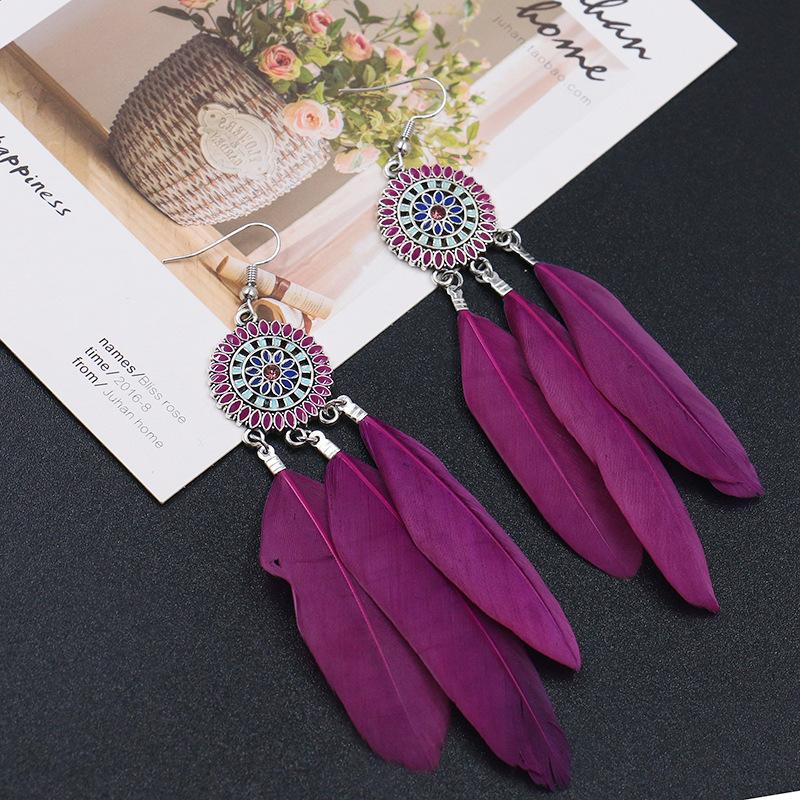 Fashion round flower ethnic retro tassel feather pendant long section earrings