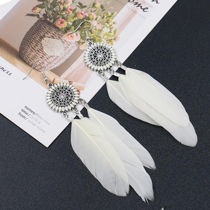 Fashion round flower ethnic retro tassel feather pendant long section earrings