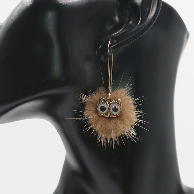 Otter hairball owl long earrings