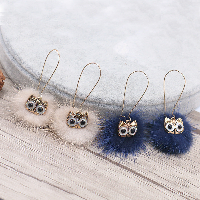 Otter hairball owl long earrings