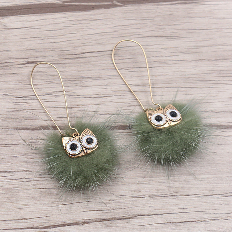 Otter hairball owl long earrings