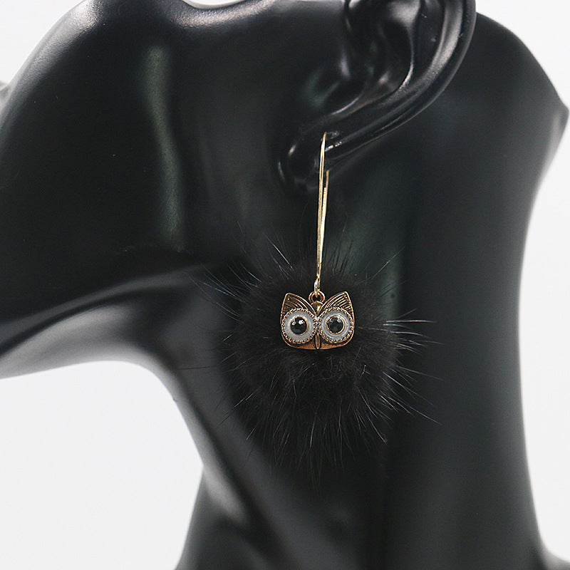 Otter hairball owl long earrings