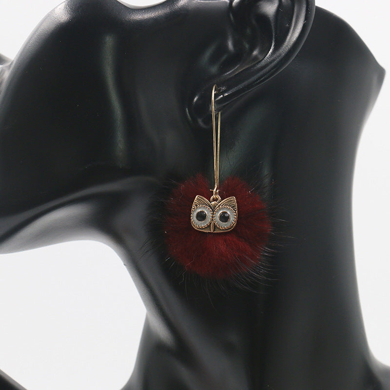 Otter hairball owl long earrings