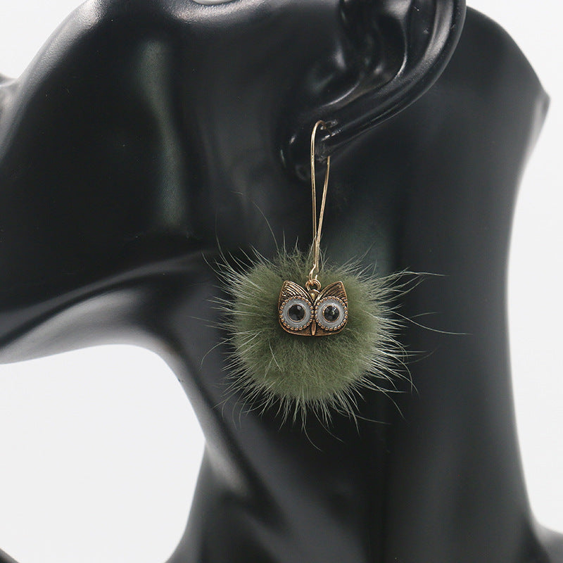 Otter hairball owl long earrings