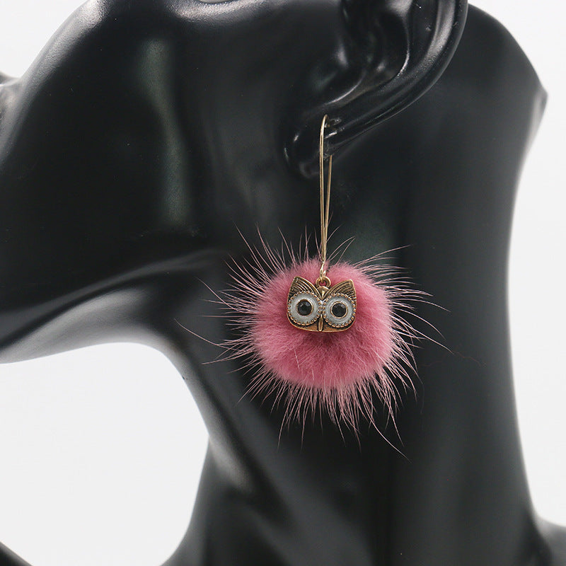 Otter hairball owl long earrings