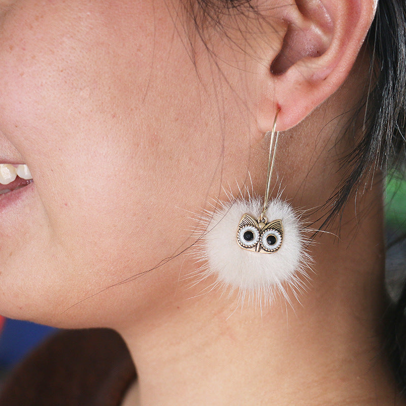 Otter hairball owl long earrings