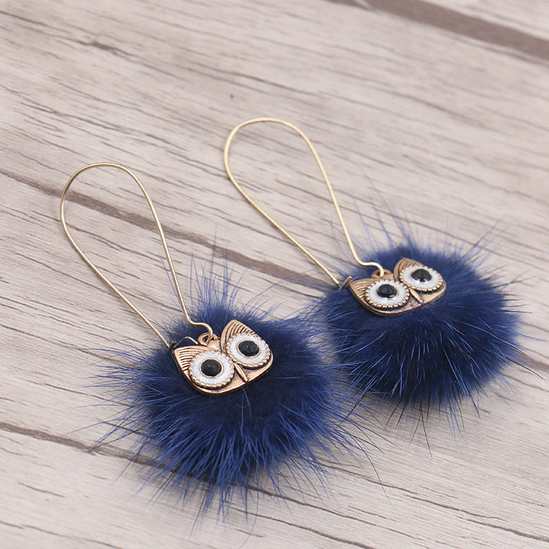 Otter hairball owl long earrings