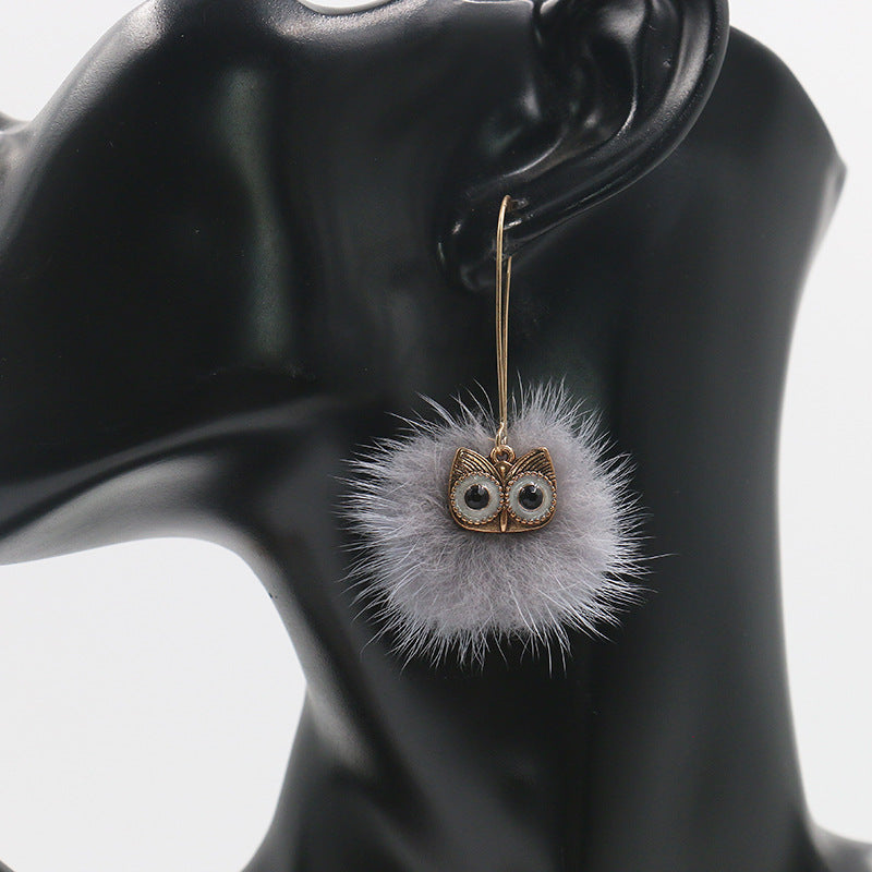 Otter hairball owl long earrings