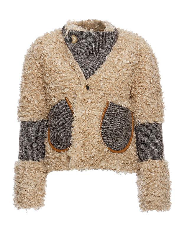 577300