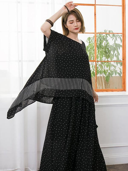 Woman Loosen Dress Suit in White Spots on Black