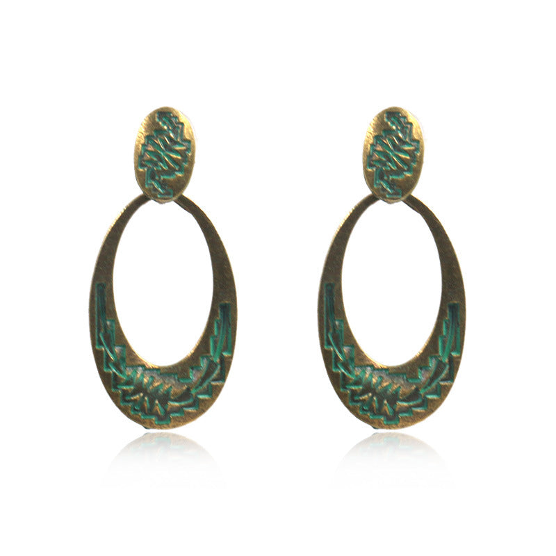 Retro oval hollow alloy pendant