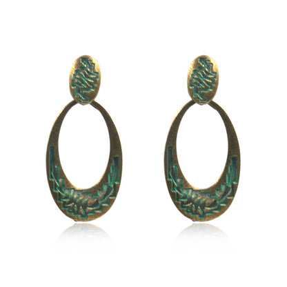 Retro oval hollow alloy pendant