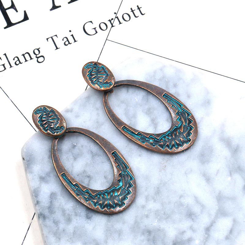 Retro oval hollow alloy pendant