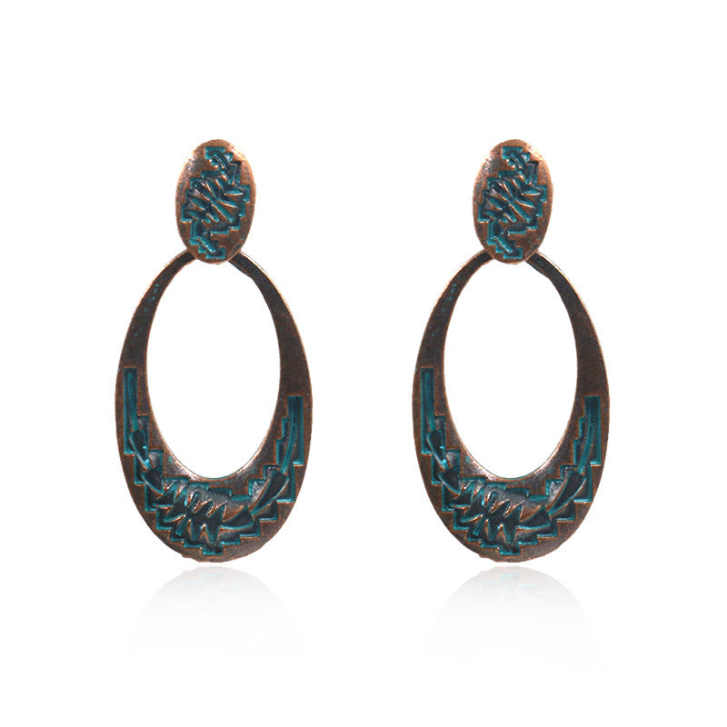 Retro oval hollow alloy pendant