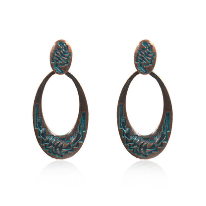 Retro oval hollow alloy pendant