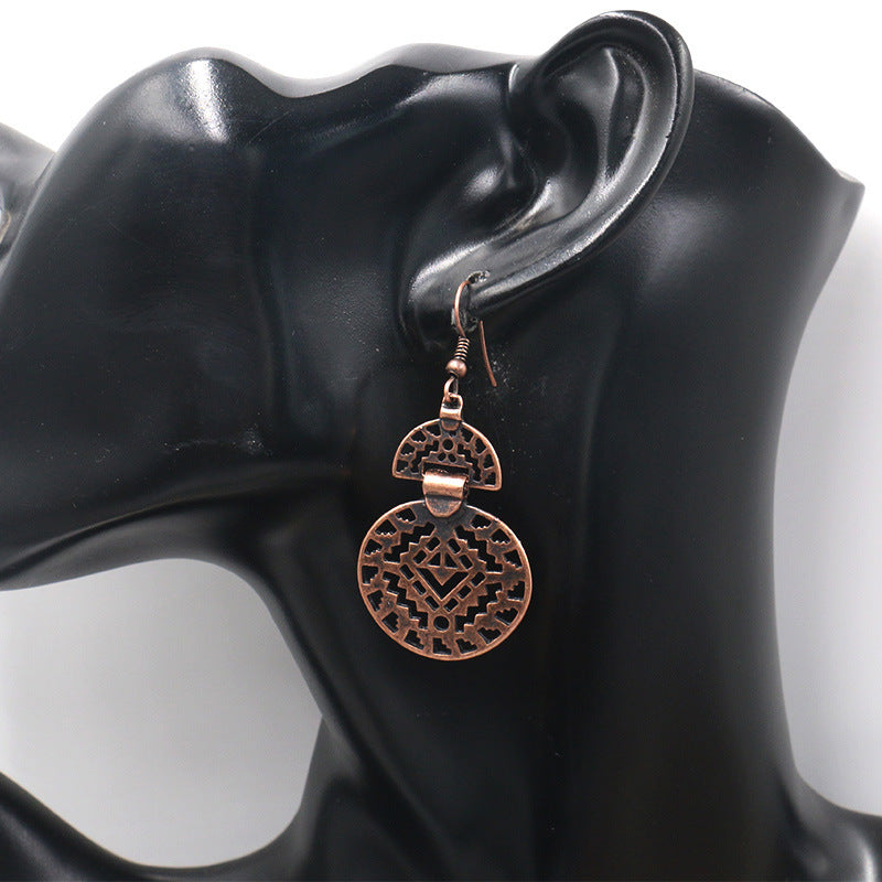 Hollow round alloy earrings