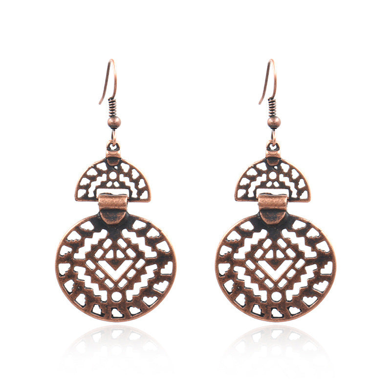 Hollow round alloy earrings