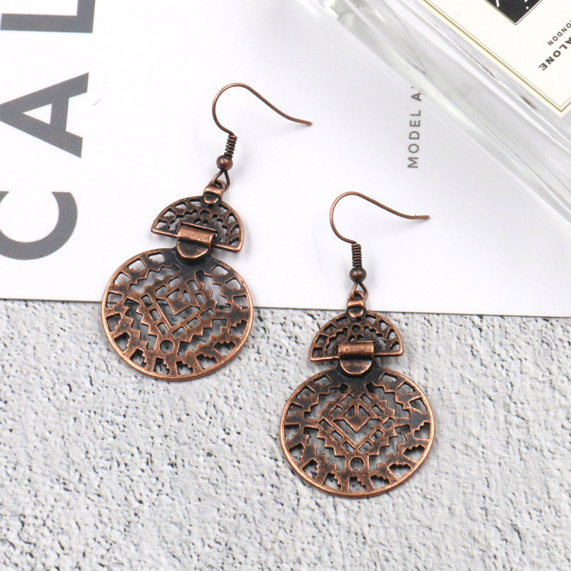 Hollow round alloy earrings