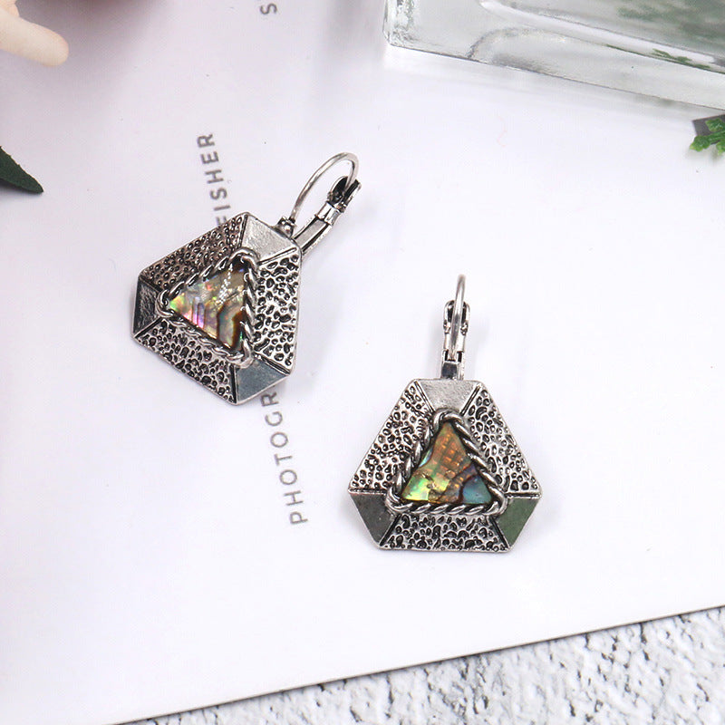 Elegant geometry with shell earrings