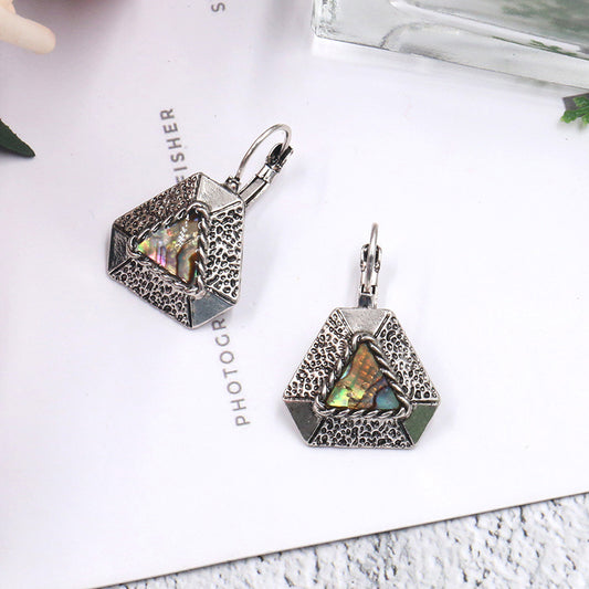 Elegant geometry with shell earrings