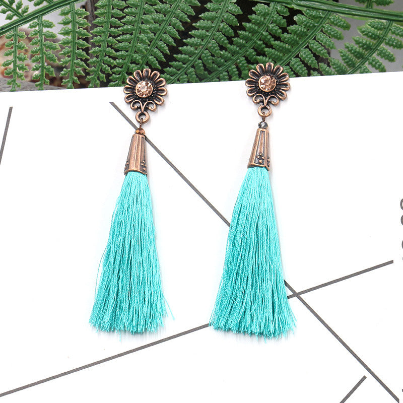 Fringed earrings with sunflower and diamond