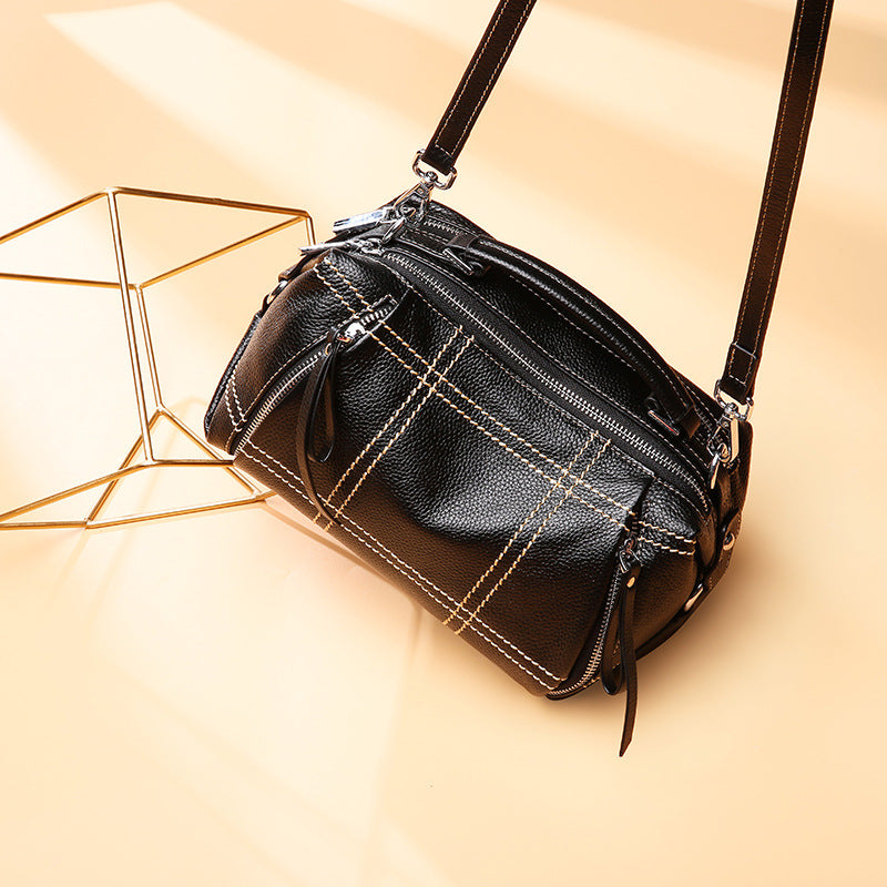 Fashionable Boston leather hand bag with crossbody style