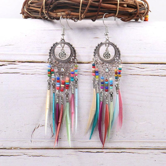 Round cutout beautiful bohemian fashion feather tassel  Earrings Wholesale