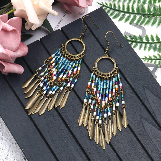 Creative beaded tassel stylish round openwork earrings