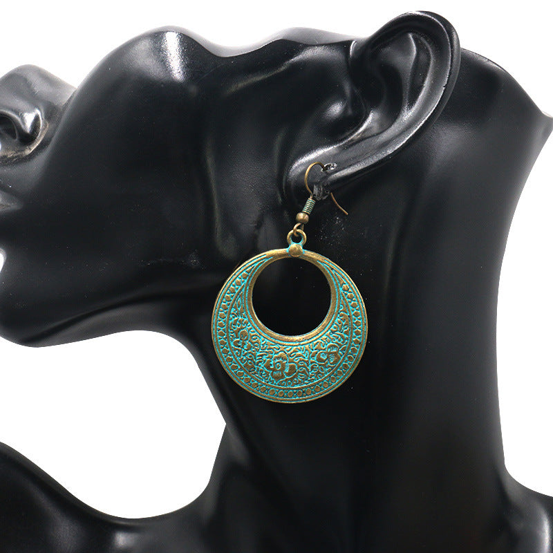 Round hollow vintage alloy earrings