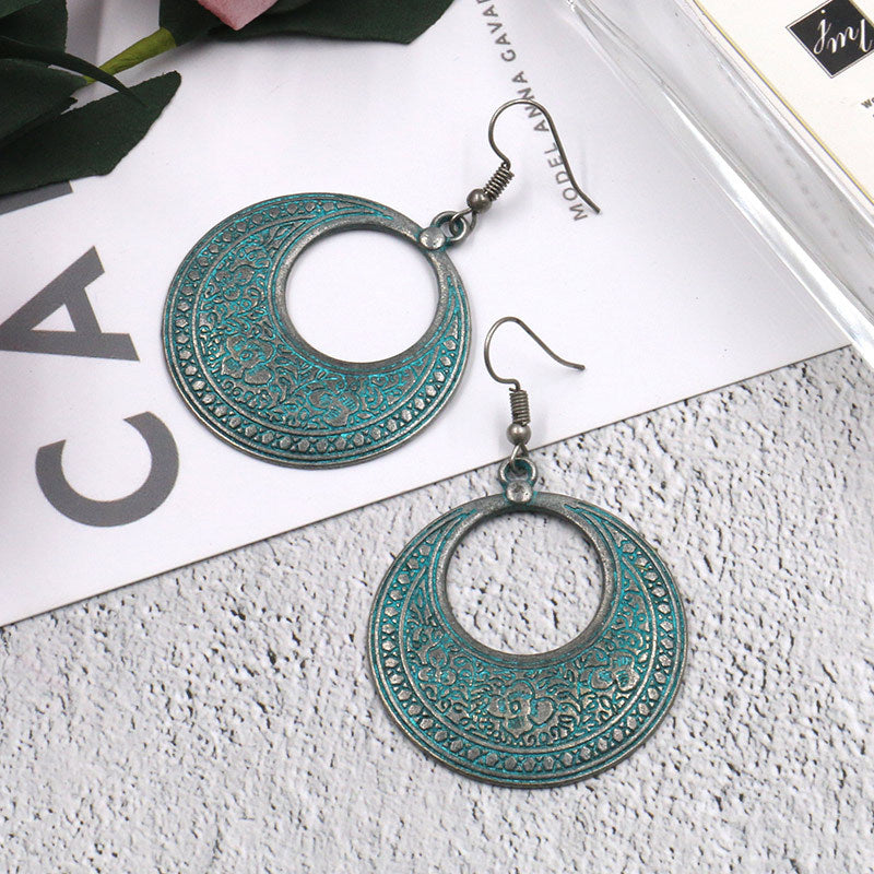 Round hollow vintage alloy earrings